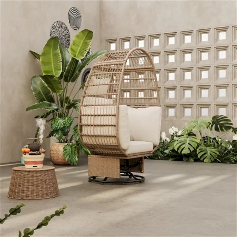 Fauteuil pivotant de jardin en rotin en forme d'œuf avec coussins et fonction à bascule