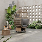 Fauteuil pivotant de jardin en rotin en forme d'œuf avec coussins et fonction à bascule
